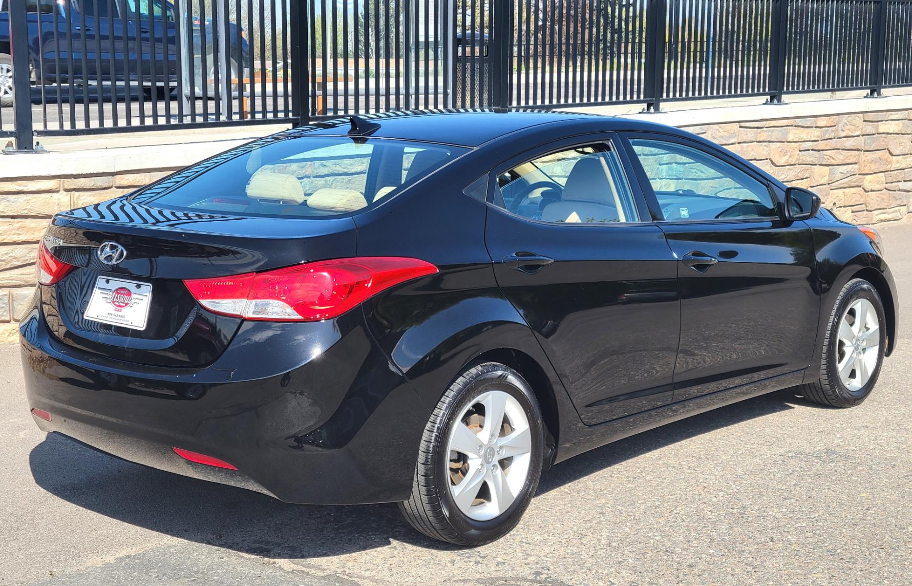 2013 Black /Tan Hyundai Elantra GLS (KMHDH4AE8DU) with an 1.8L I4 engine, 6 Speed Auto transmission, located at 450 N Russell, Missoula, MT, 59801, (406) 543-6600, 46.874496, -114.017433 - Low Mile Front Wheel Drive Sedan. One Owner. Excellent Fuel Economy. 1.8L I4 Engine. 6 Speed Automatic Transmission. AirConditioning. Power Windows and Locks. Bluetooth. - Photo #1